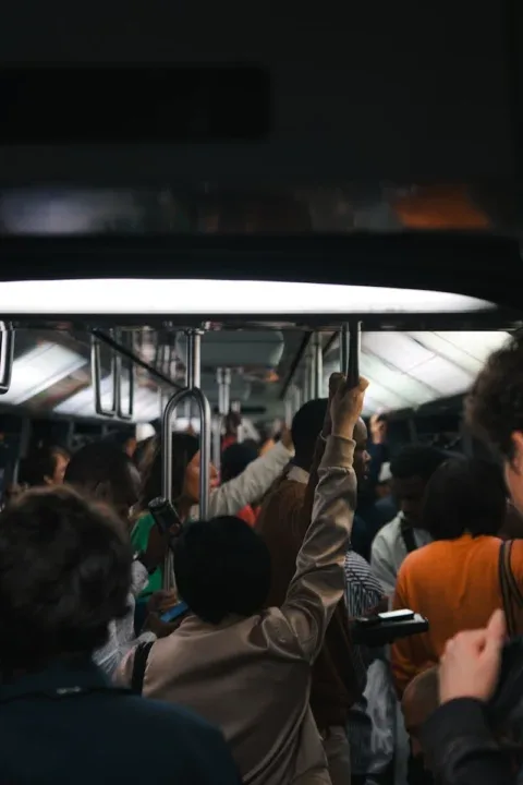 a group of people riding on a bus